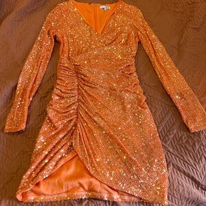 Orange sequined dress